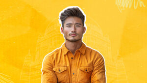 A male influencer in an orange shirt representing key influencer marketing trends for Q4 with a cultural landmark background
