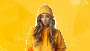 A female influencer in a yellow hoodie symbolizing creative content strategies for brand engagement with heritage architecture background