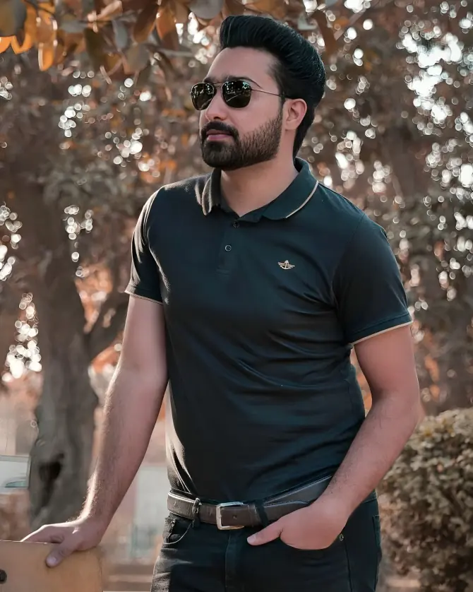 Shahrukh Nazar Malik, stylish entrepreneur posing confidently in outdoor setting for Influencers of Multan campaign