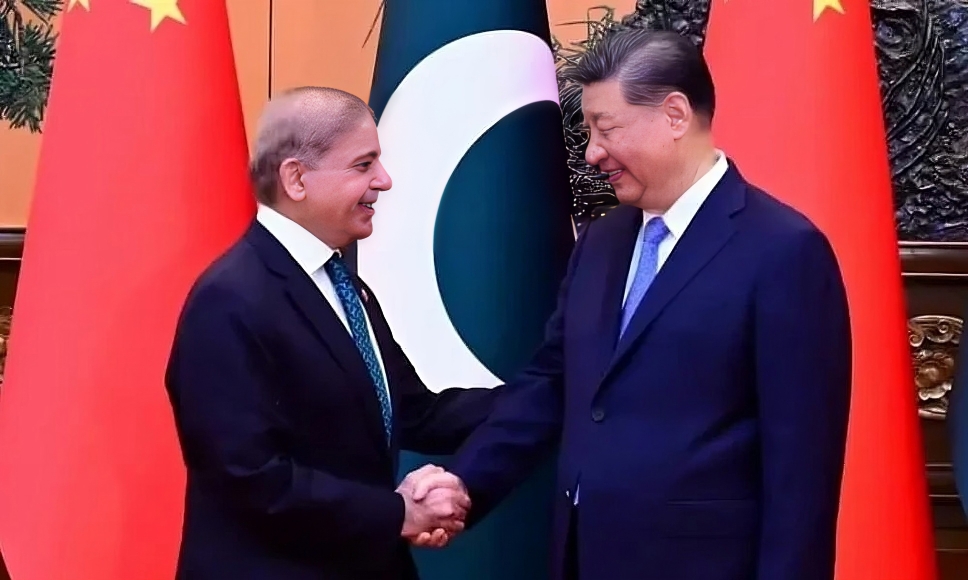Shehbaz Sharif and Xi Jinping shaking hands, symbolizing the deep friendship between Pakistan and China, with their flags in the background.