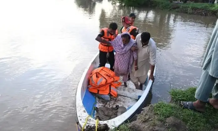Boatmen accused of charging flood victims for rescue boat rides