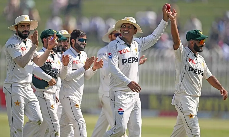 Pakistan cricket team players celebrate during a Test match, representing the squad for South Africa series
