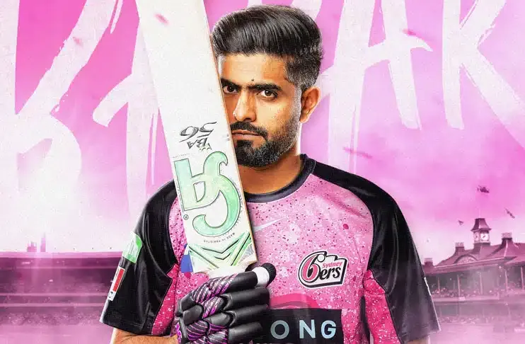 Babar Azam in Sydney Sixers pink jersey holding a cricket bat ahead of his BBL debut fan zone launch