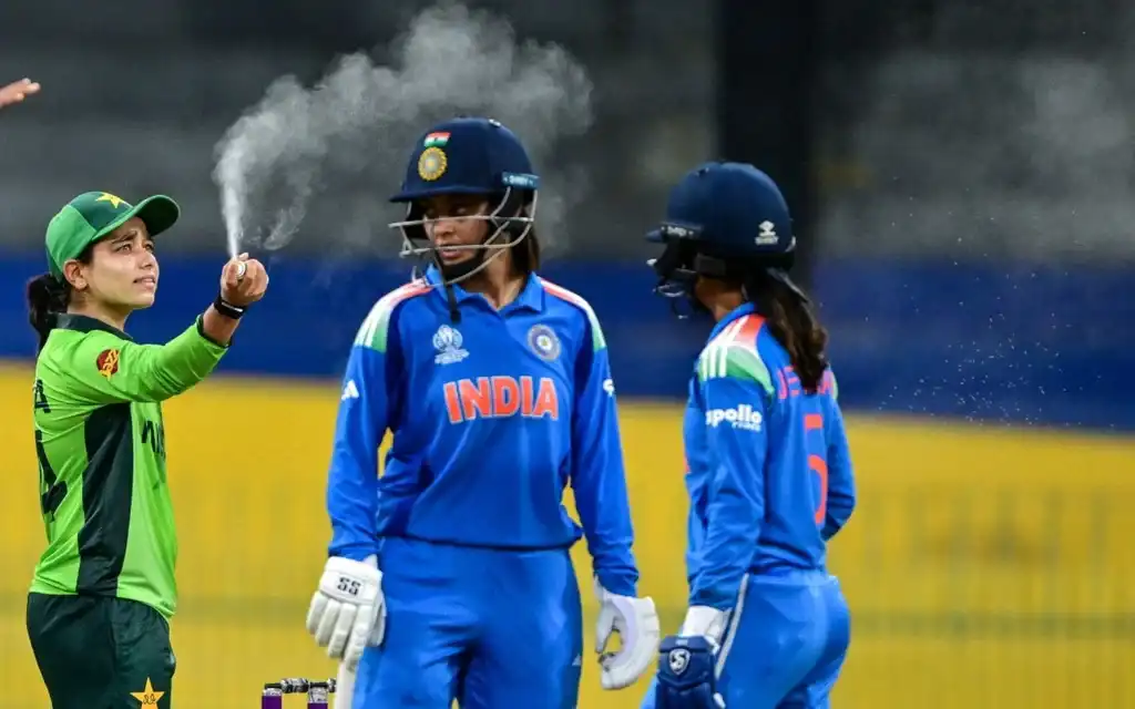 Pakistan captain Fatima Sana spraying insect repellent during Pakistan vs India Women’s World Cup 2025 match in Colombo.