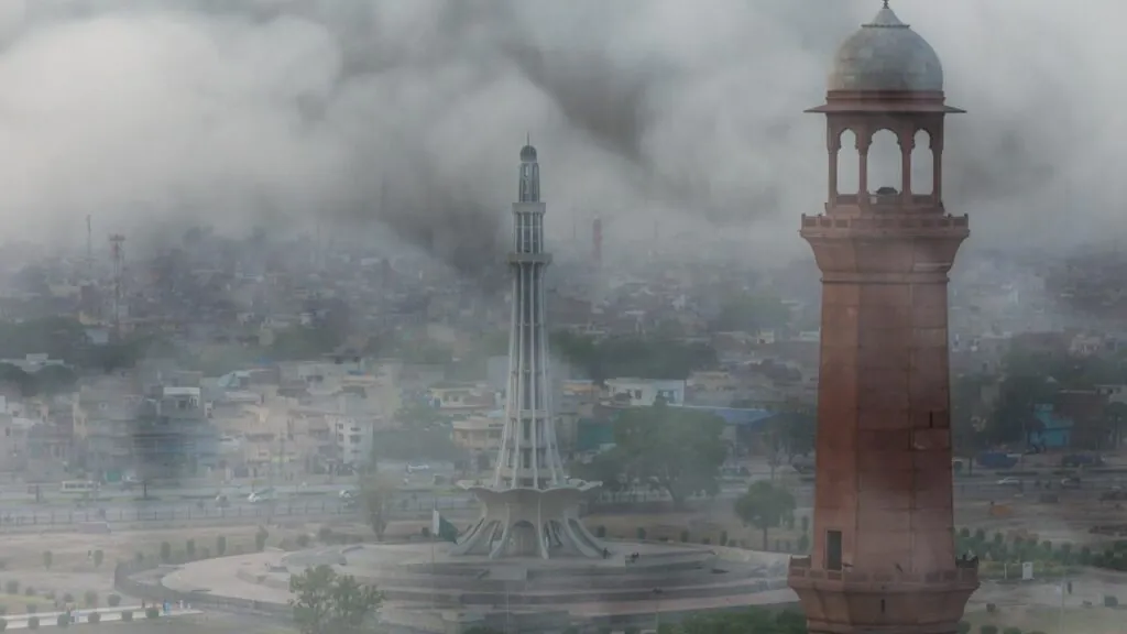 Aerial view of Lahore covered in smog with Minar-e-Pakistan visible, representing severe air pollution in the city