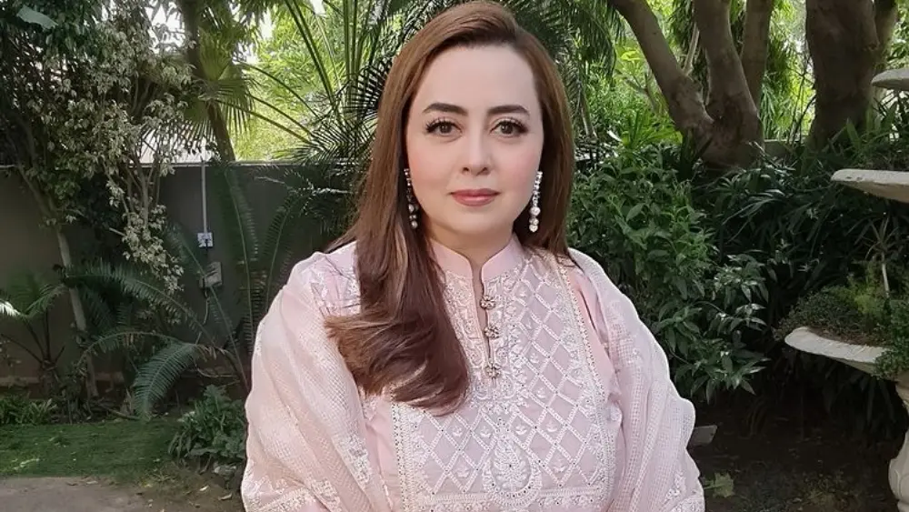 Pakistani fashion designer Maria B poses in a pastel outfit after donating PKR 6.4 million to support 2025 flood victims through her Maria B. Cares initiative