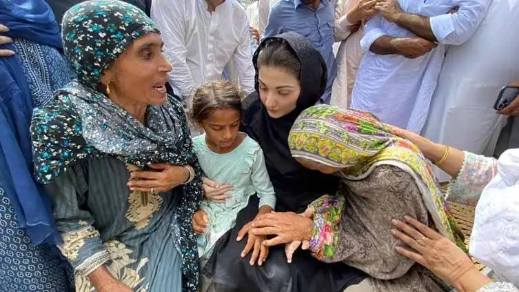 Punjab CM Maryam Nawaz comforting flood victims during her visit as part of Rs100 billion relief package announcement