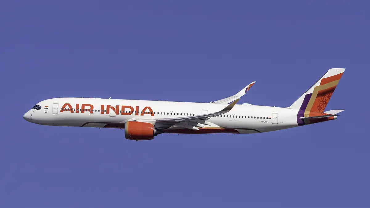 Air India aircraft in flight representing Pakistan’s extended airspace ban on Indian flights until November 23.