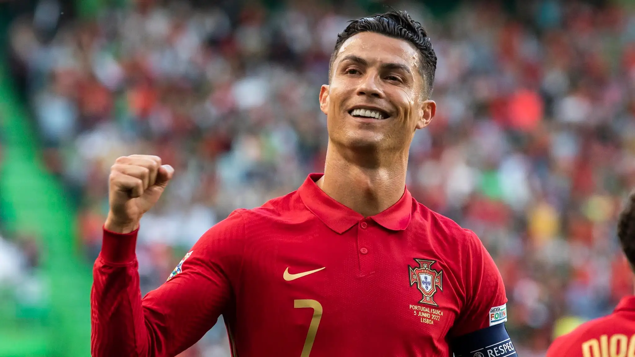 Cristiano Ronaldo celebrates after scoring in FIFA World Cup qualifier, setting a new world record for most goals.