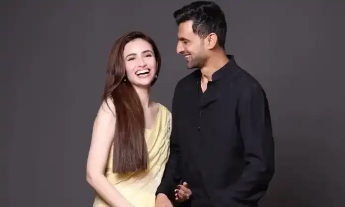 Shoaib Malik with actress Sana Javed smiling together before divorce rumors.