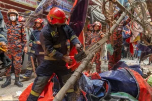 Firefighters clearing collapsed debris after Bangladesh Earthquake 2025