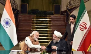 Indian and Iranian leaders shaking hands during a diplomatic meeting, representing the Iran Visa-Free Suspension