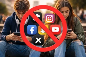 Teenagers using smartphones with social media icons crossed out as India proposes a social media ban for teens