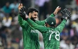 Pakistan players celebrating victory in stadium during Shadab Khan World Cup campaign match