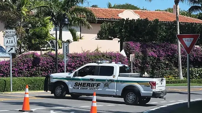 Law enforcement vehicles securing Mar-a-Lago estate after Mar-a-Lago shooting incident