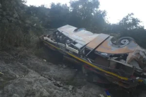 Overturned passenger bus after Nepal Bus Accident near Trishuli River in Dhading district