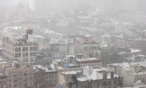 Heavy snowfall covering buildings during New York Snowstorm in the city