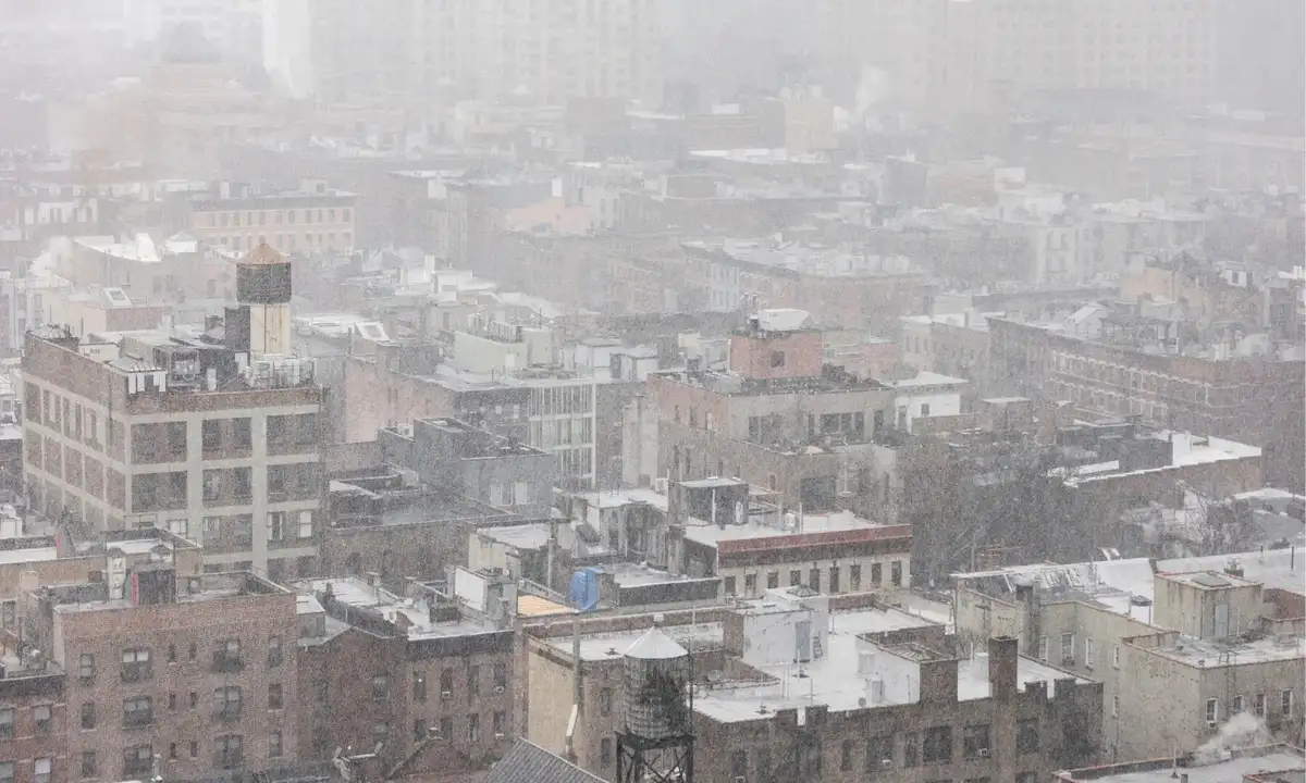 Heavy snowfall covering buildings during New York Snowstorm in the city