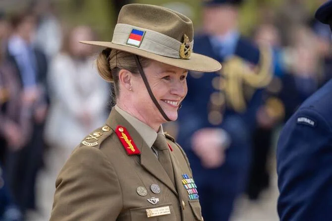 A smiling Lieutenant General Susan Coyle in a formal Australian Army uniform, representing her appointment as the first female Australia Army Chief.