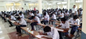Students appearing in Karachi exams inside examination hall under strict conditions