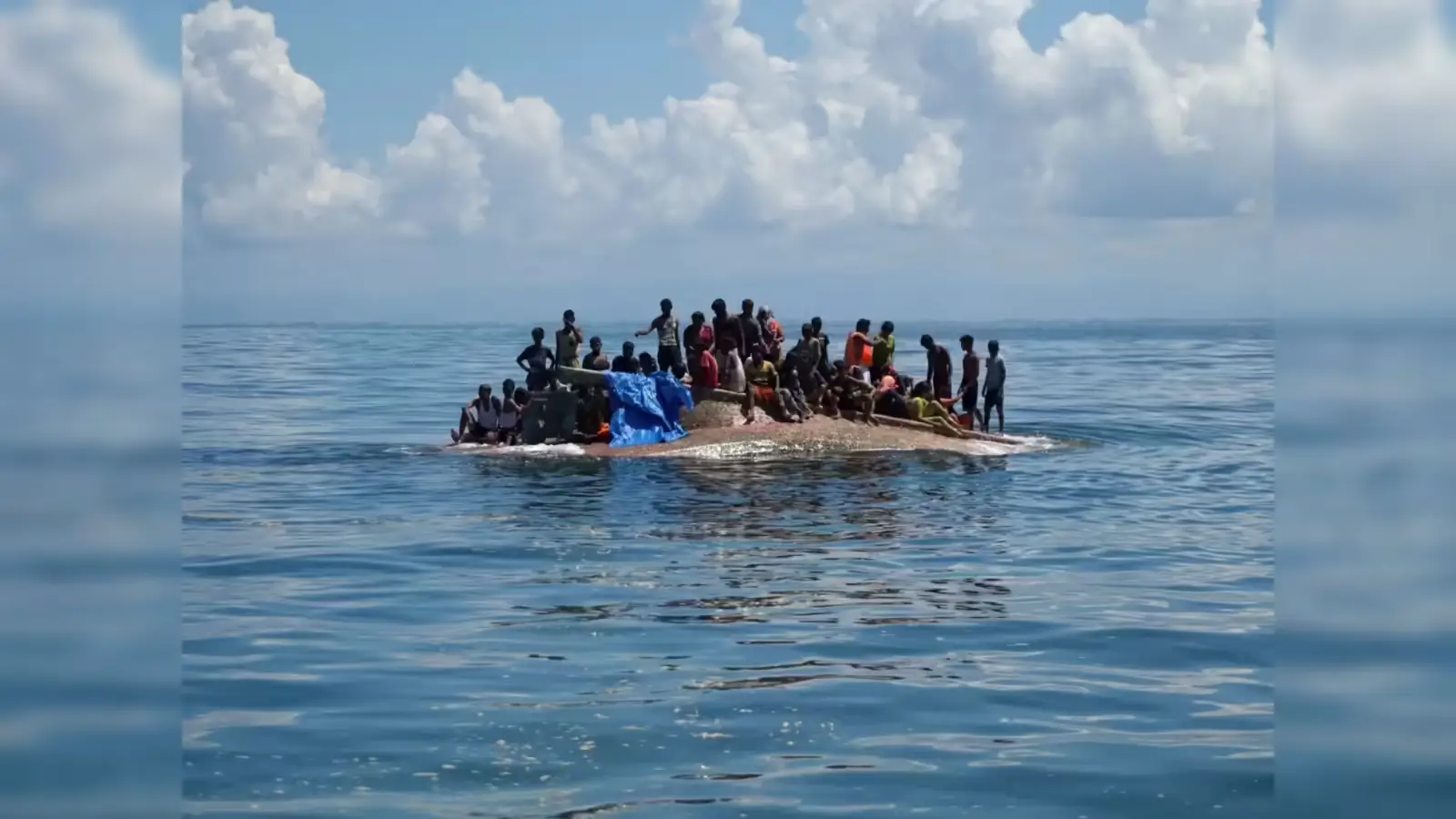 Rohingya boat tragedy showing refugees stranded in the Andaman Sea after vessel capsized