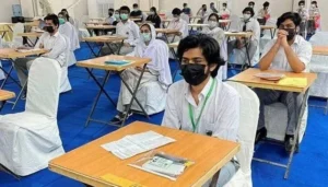 Students appearing in AS-level mathematics examination during Cambridge paper leak controversy in Pakistan