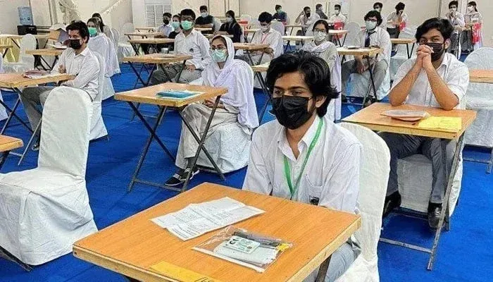 Students appearing in AS-level mathematics examination during Cambridge paper leak controversy in Pakistan