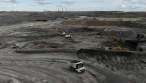 Heavy machinery operating at coal mining site after China mine blast in Shanxi province
