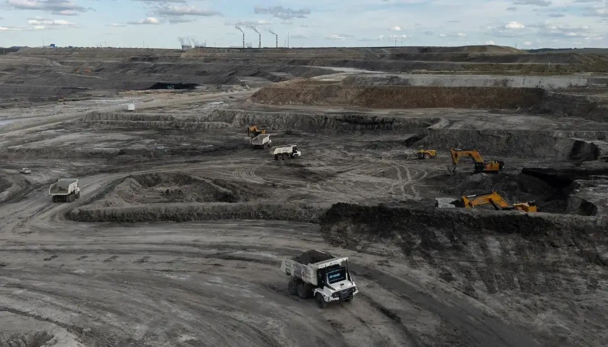 Heavy machinery operating at coal mining site after China mine blast in Shanxi province