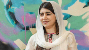 High quality landscape graphic of Malala Yousafzai speaking about education, youth empowerment, and Pakistan’s future progress