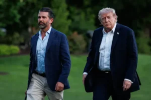 Donald Trump walking with Donald Trump Jr amid Trump wedding news