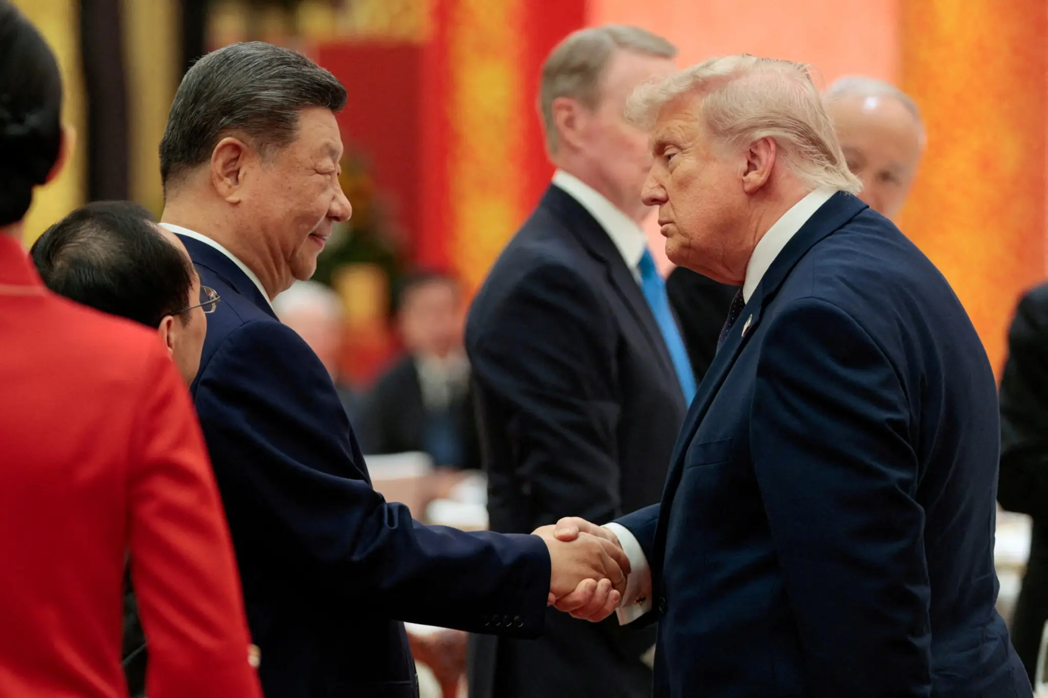 Donald Trump and Xi Jinping shaking hands during the Trump Xi Summit in Beijing