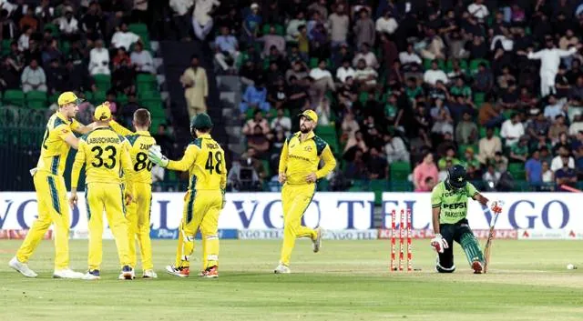 Australia players celebrate a wicket during the Australia Pakistan ODI match at Gaddafi Stadium Lahore