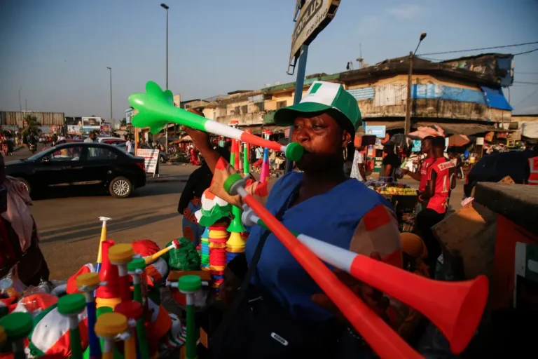 Street vendor displaying vuvuzelas ahead of the tournament, representing the FIFA Vuvuzelas Ban for the 2026 World Cup.