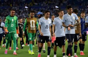 Uruguay players leave the pitch after elimination as France Spain World Cup group stage results confirm Spain's top spot and Uruguay's exit.