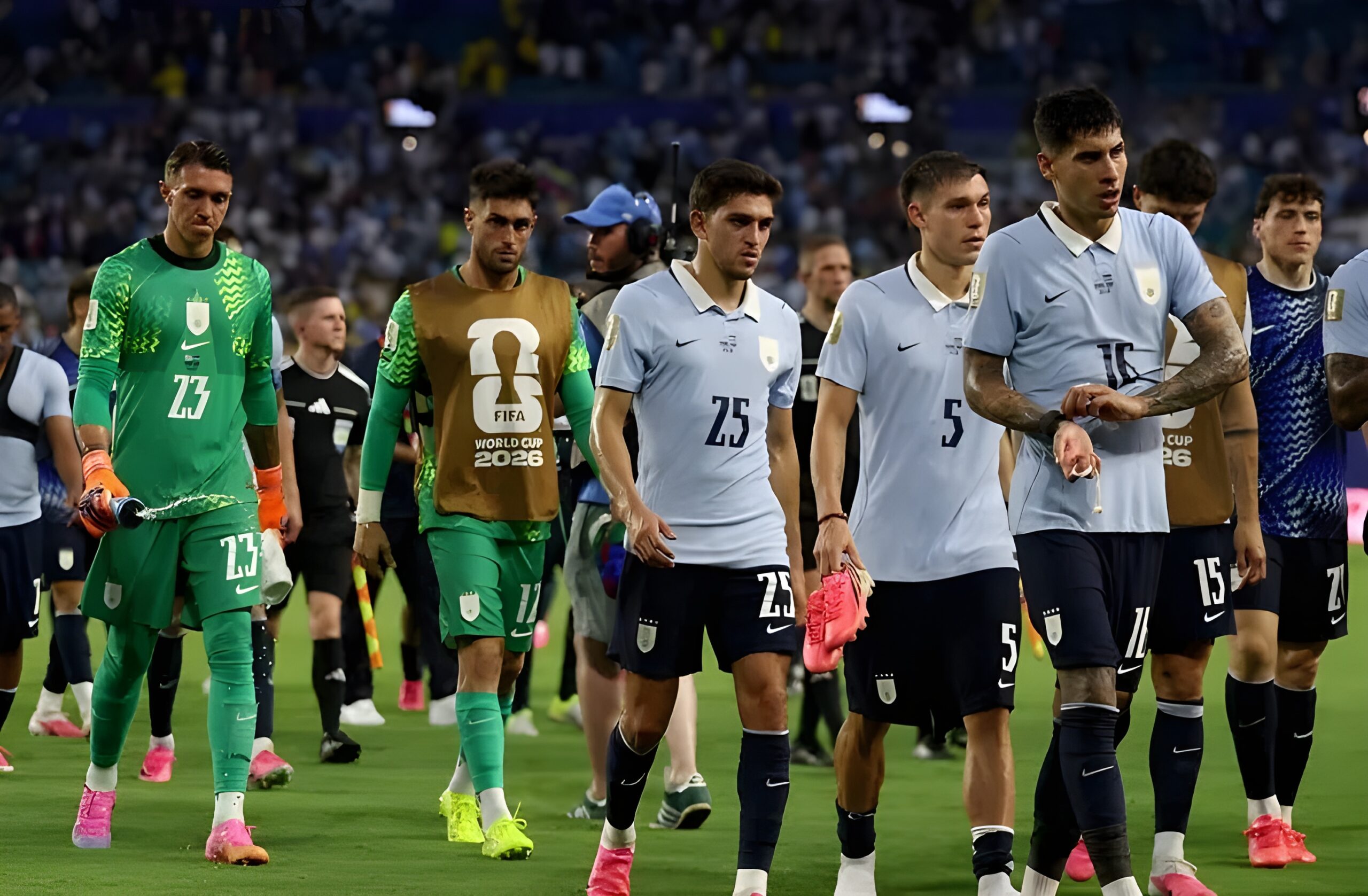 Uruguay players leave the pitch after elimination as France Spain World Cup group stage results confirm Spain's top spot and Uruguay's exit.