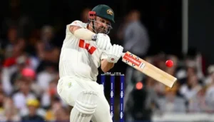 Australian batter playing a shot with the ICC Pink Ball during a Test cricket match