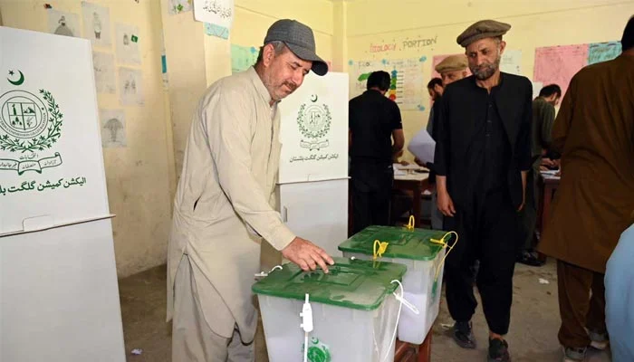 Voters casting ballots during Gilgit Baltistan Elections amid concerns over delayed results and election transparency