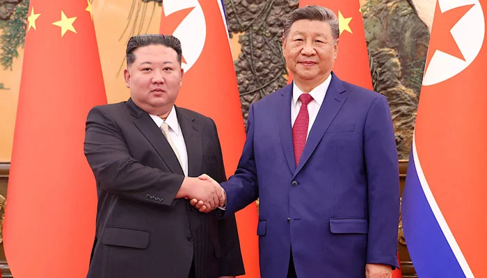 Xi Jinping and Kim Jong Un during the Xi North Korea visit aimed at strengthening diplomatic and economic ties