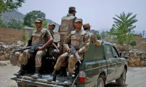 Pakistani Army soldiers patrol a mountainous area during a counter-terrorism mission where KP Terrorists Killed in security operations.
