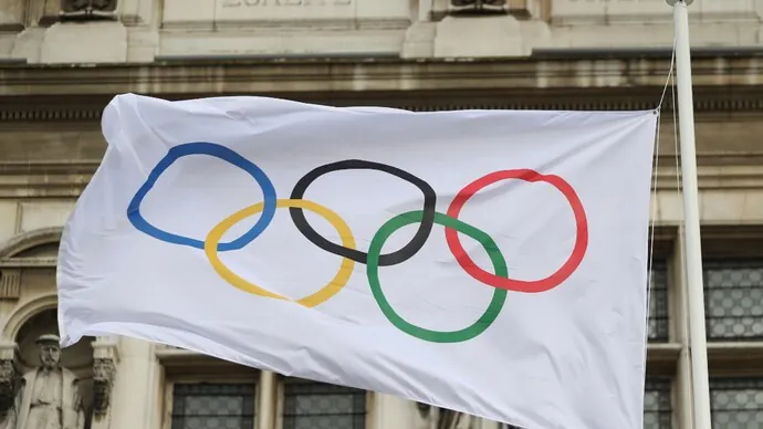 Olympic flag displayed ahead of LA Olympics Cricket qualification announcement for the 2028 Olympic Games.