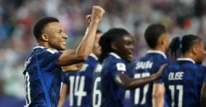 Kylian Mbappe celebrating with France team after Mbappe France Win in World Cup match