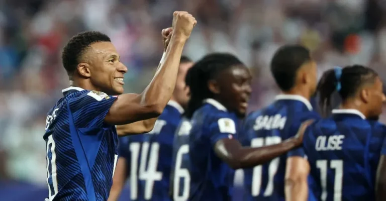 Kylian Mbappe celebrating with France team after Mbappe France Win in World Cup match