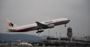 Malaysia Airlines Boeing 777 taking off as the MH370 Search continues under Malaysia's extended agreement through 2027.