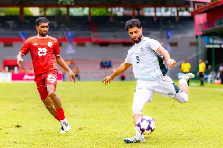 A Pakistan football player controls the ball during the Pakistan Maldives Win match in the Diamond Jubilee Four Nation Football Tournament.