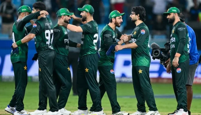 Pakistan cricket team players standing together during a match related to PCB Central Contracts