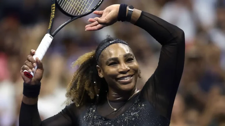 Serena Williams waves to fans during her return to professional tennis competition at Queen's Club