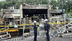 Police inspect the damaged Hanwha Aerospace facility after the South Korea Blast in Daejeon that killed five workers.