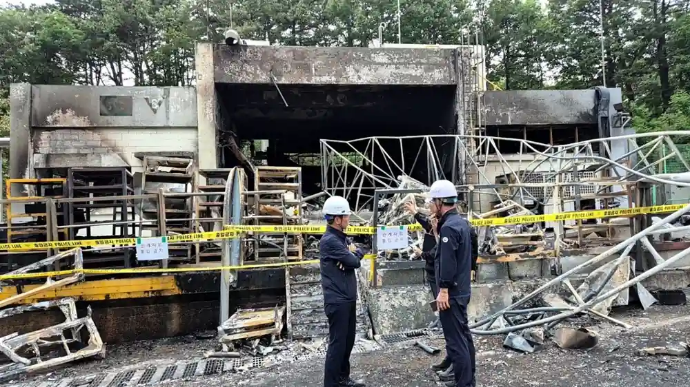 Police inspect the damaged Hanwha Aerospace facility after the South Korea Blast in Daejeon that killed five workers.
