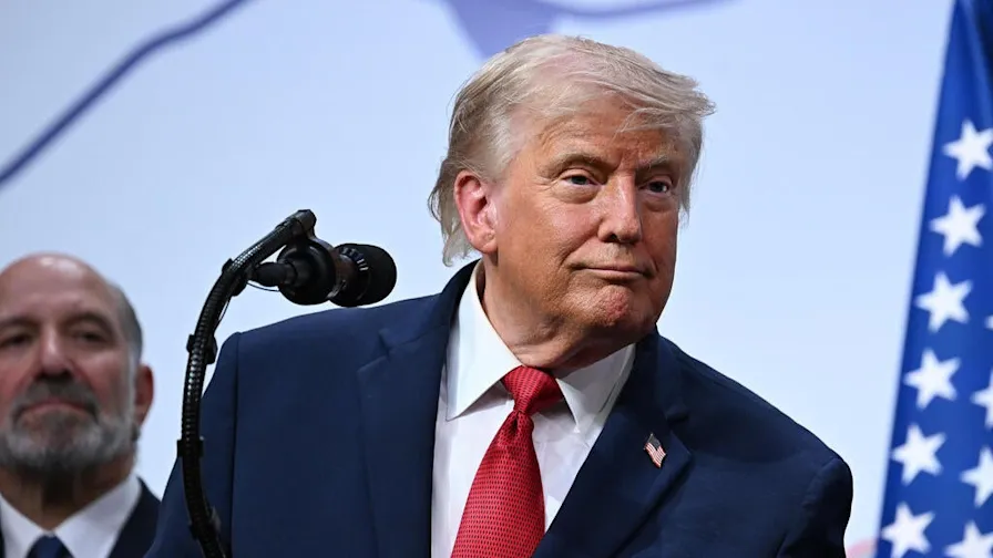 Donald Trump speaking at an event during discussions related to the Trump Iran Deal.
